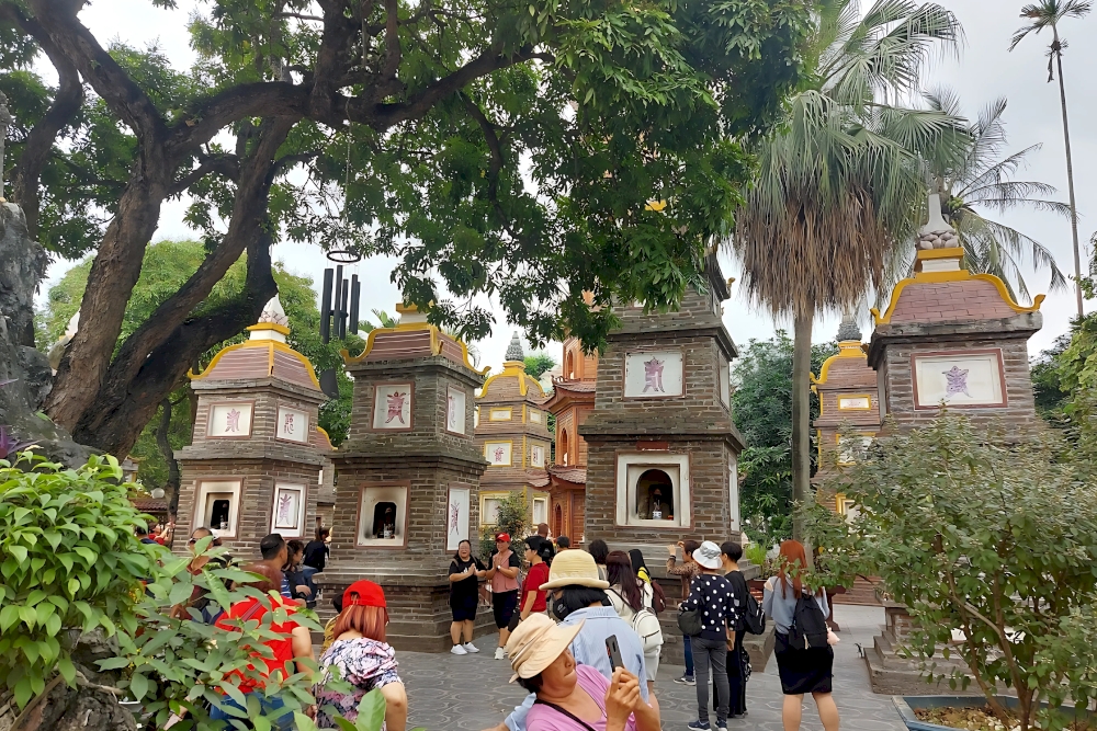 Embrace the serenity of Tran Quoc Pagoda with respectful behaviors, modest attire, and mindful appreciation